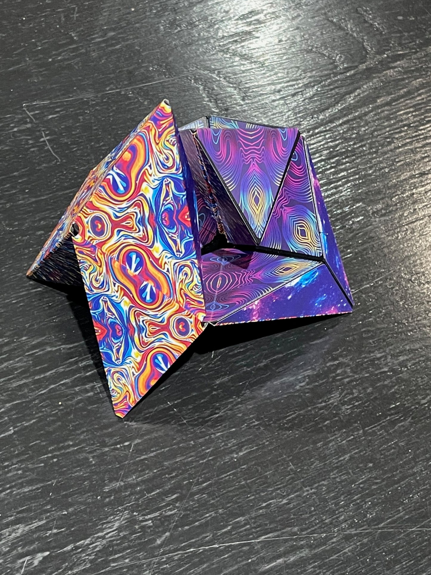 Conundrum House - Kaleidoscope pattern inside out. One of the over 70 shapes that the Unfolding Magnetic Magic Cube can be shaped into.