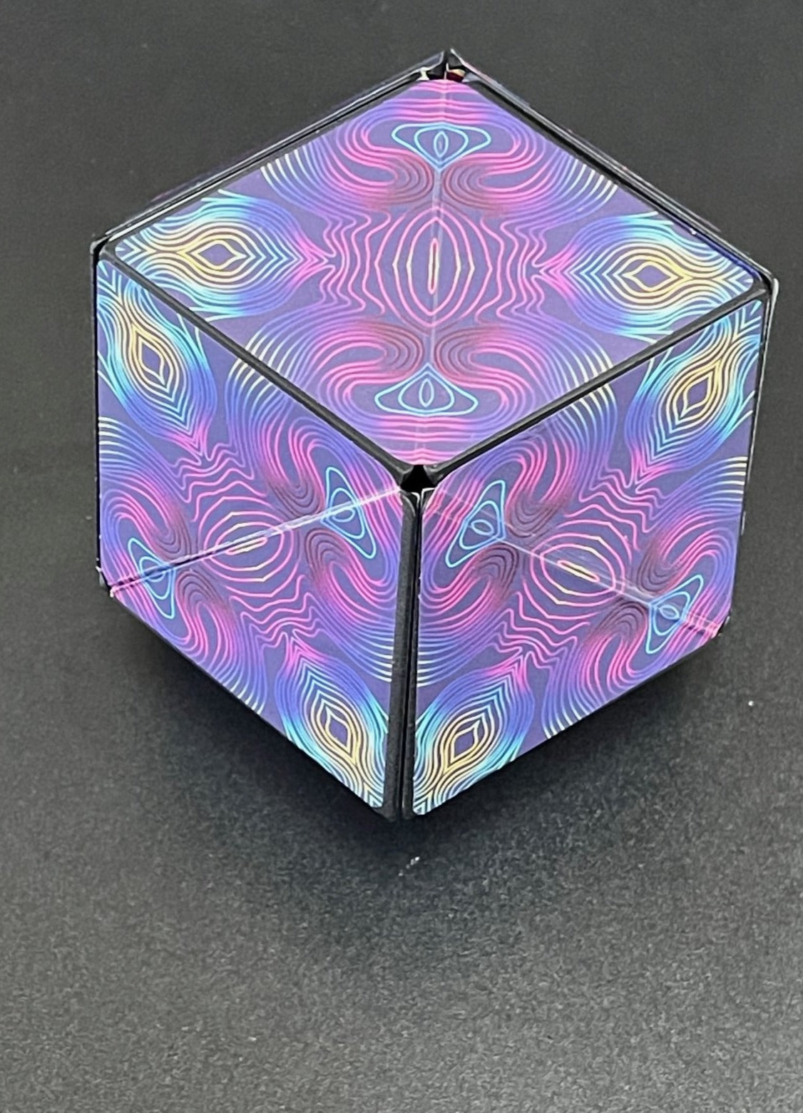 Conundrum House - Kaleidoscope pattern inside out. One of the over 70 shapes that the Unfolding Magnetic Magic Cube can be shaped into.
