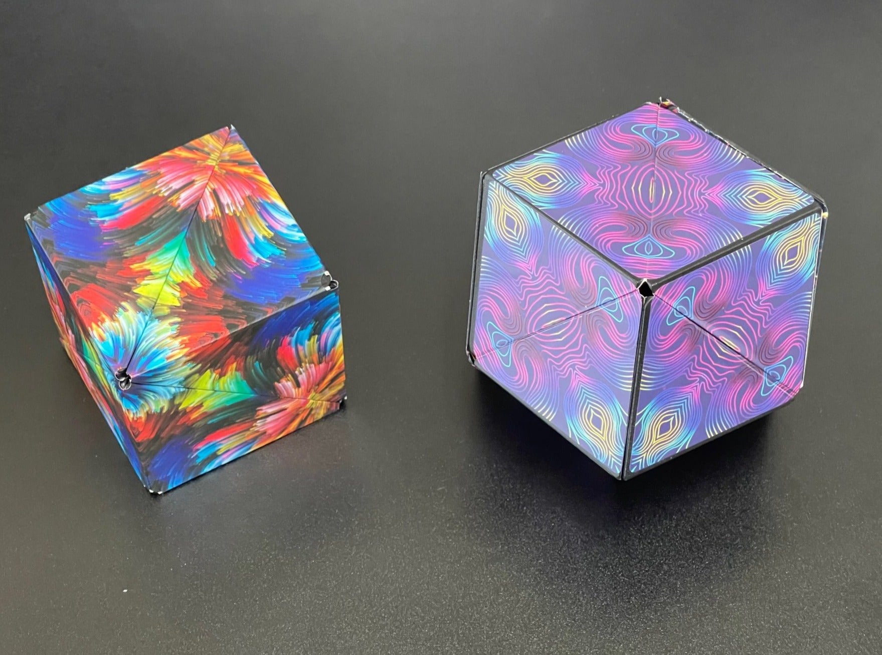 Conundrum House - Kaleidoscope pattern inside out and Color Burst cube. Two of the over 70 shapes that the Unfolding Magnetic Magic Cube can be shaped into.